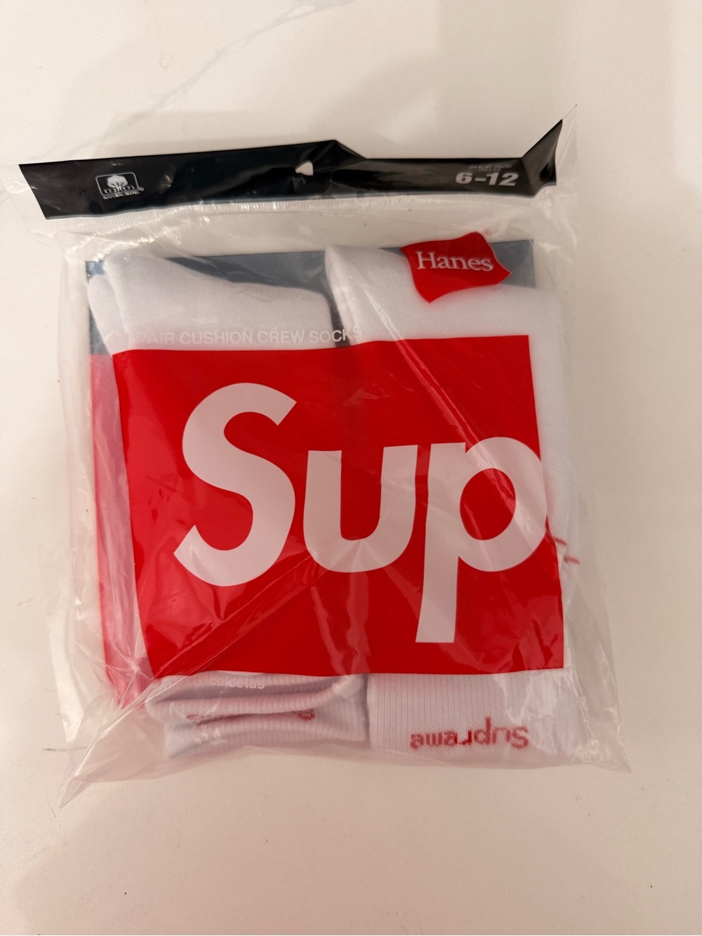 white Supreme socks